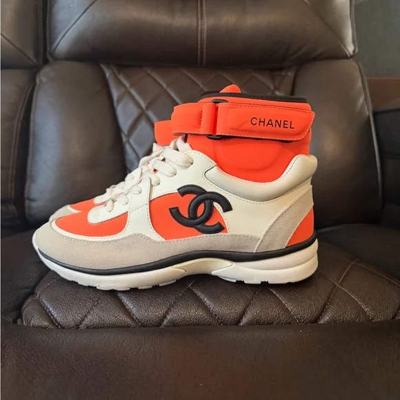 CHANEL Vibrant Orange and Cream Sneakers